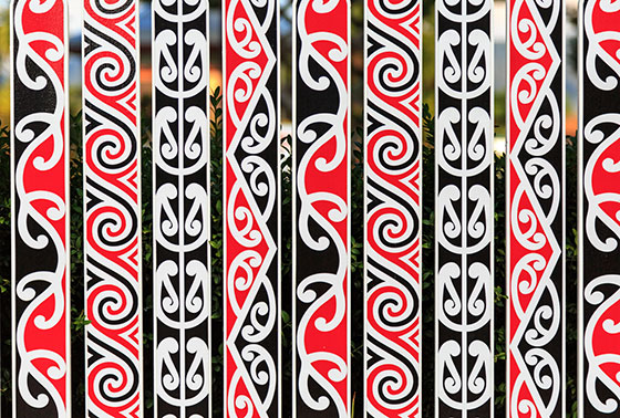 maori patterns on a fence thumb4